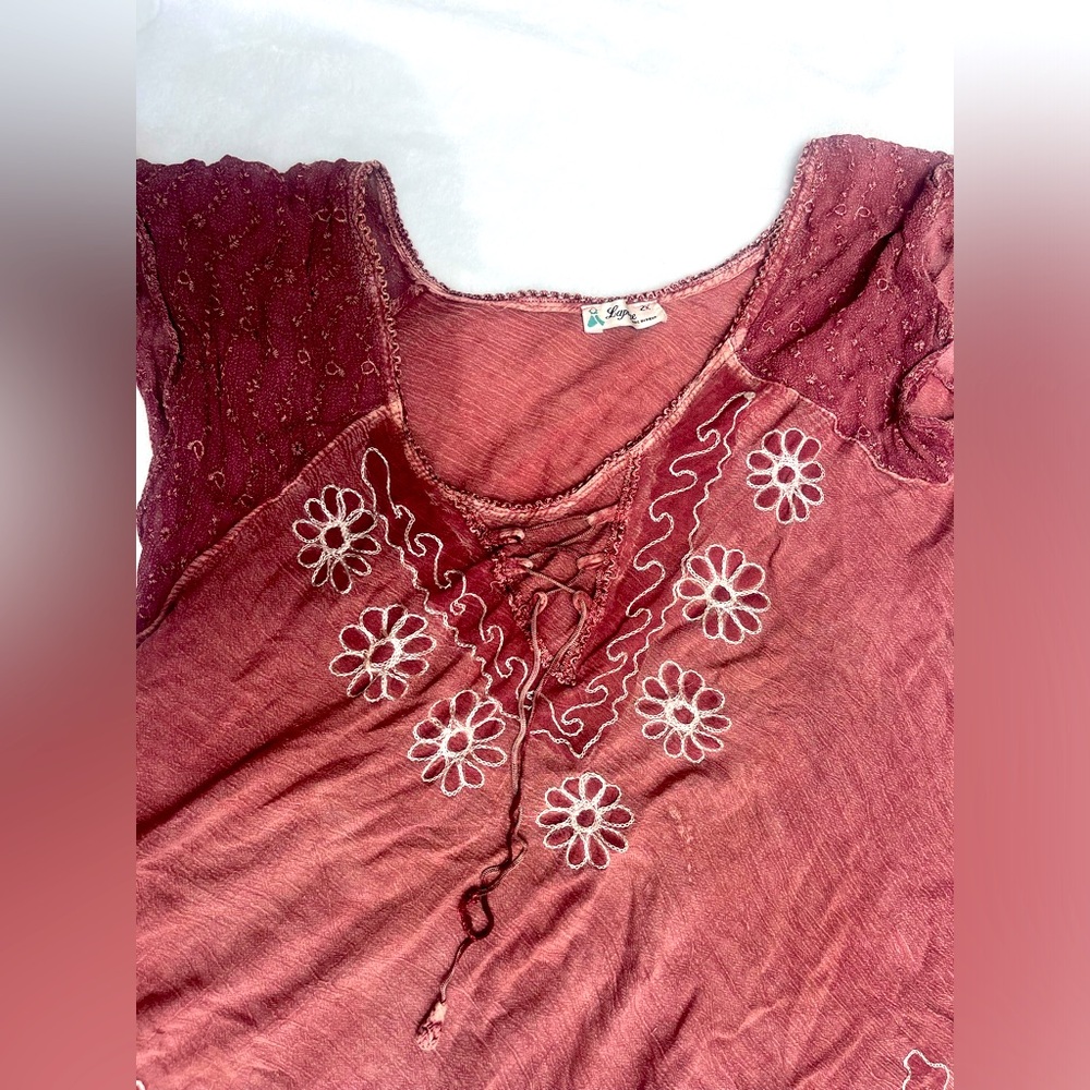 Boho pink top with embroidered details